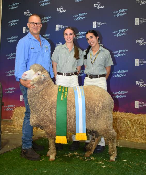With the reserve grand champion autumn shorn ewe and reserve champion autumn shorn Poll Merino ewe under 1.5 years from the WA College of Agriculture Harveys Mornington stud were its sheep technical officer Steve Adams (left) and students Bethany Rutten and Kendall Heliams.