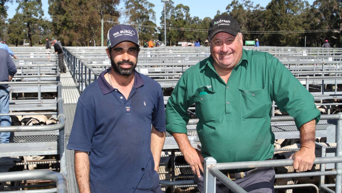  Paul Ferraro, Yarloop and Nutrien Livestock South West livestock manager Peter Storch, discussed the yarding off 1600 store cattle at Boyanup