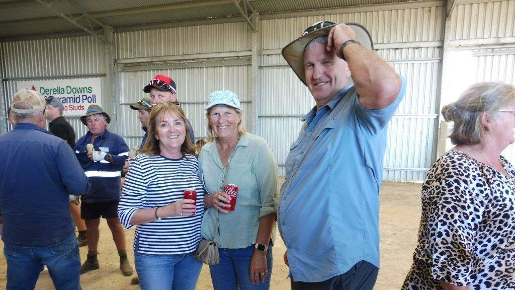 Esperance region locals Kym Schmedje (left) and Wendy and Peter Harkness after the sale.
