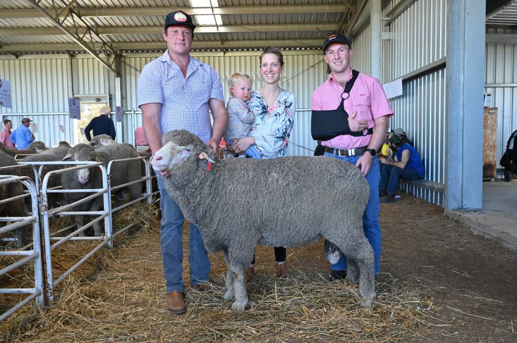 With the $11,500 top-priced ram sold at the annual Mianelup stud sale at Gnowangerup were Mianelup stud principal Elliot Richardson (left), with partner Marthe Du Plessis d'Argentre, holding their two-year-old daughter Celeste and Elders Gnowangerup representative James Culleton. Geoff and Bernadette Davidson, Moorundie Poll Merino stud, Keith, South Australia, secured the 118kg sire.