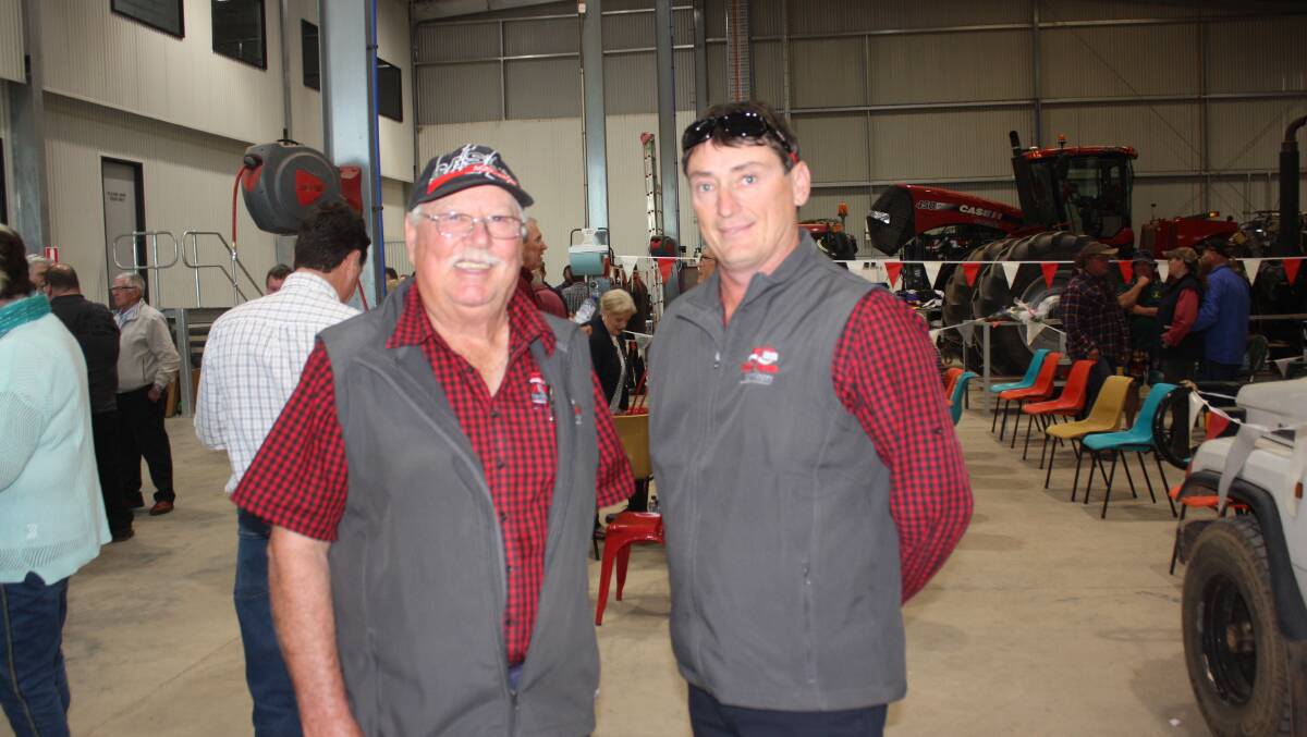 Former Boekeman Machinery branch manager Colin Riggs (left) and his successor Peter Crippen have chalked up the years with the company with Colin finally announcing he'll be retiring next January after 36 fun-filled and some times exasperating years. At last week's official opening he was presented with two model tractors an Inter 856 model which was a top seller when he started with Boekeman and a 340 Case IH Magnum, the latest model on offer. Peter, who took over from Colin as Dowerin branch manager earlier this year, isn't too far behind with 32 years to his credit. He is more likely to be presented with two computers when he retired to mark his expertise in precision farming. The first will probably be a replica of a Commodore 64 and the second will be something that hasn't been invented yet.