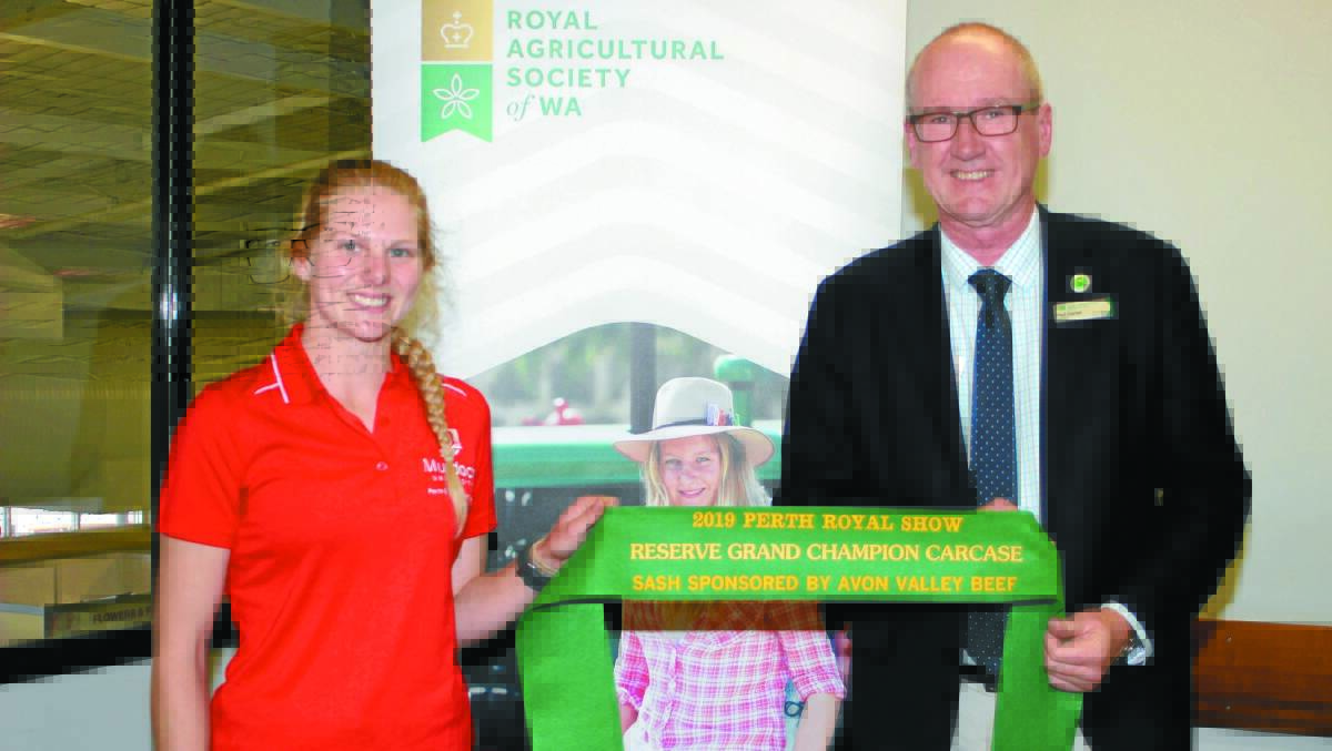  Murdoch University has another successful year in the carcase competition coming away with the reserve grand champion carcase title. Second year Murdoch University Animal Science student Ellie Williams (left), was presented with the broad sash from Perth Royal Agricultural Society president Paul Carter.