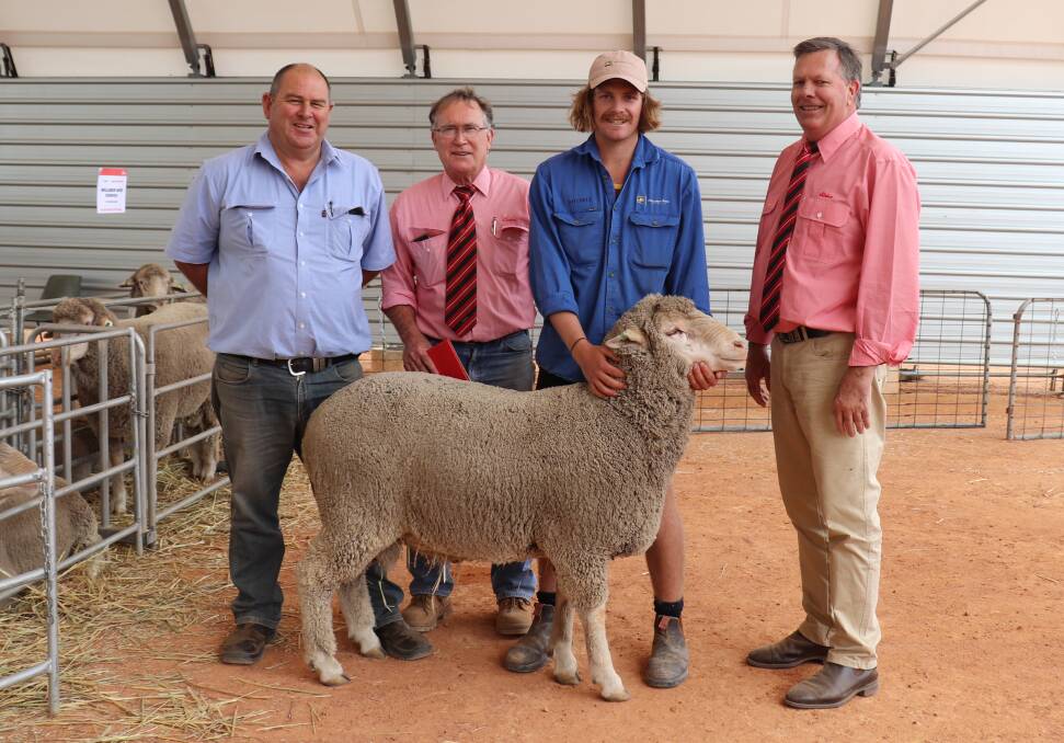 Regular repeat buyer Andrew Tunstill (left), AN & E Tunstill, Burakin, paid $2400 for the second top-priced ram. With him are Elders Koorda agent Wayne Maher, Mollerin Rock Dohnes co-principal Mitchell Applegate and Elders auctioneer Graeme Curry.