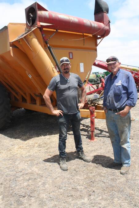 The clearing sale on the Torradup property at Munglinup brought back memories for Dalyup farmer John Luberda (right) pictured here with his son Peter. "I use to do contract seeding and hay-making here in 1962," he said. They looked over this Norrish 24 tonne dual axle ChaseMor chaser bin with extension auger. From an opening bid of $15,000, it was finally knocked down for $35,000.