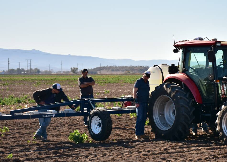 Growers pictured inspecting the new Trimble WeedSeeker 2 spot- spraying system.