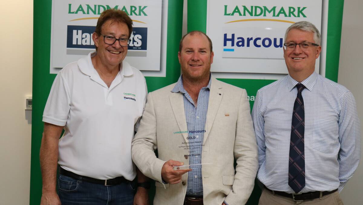 The Landmark Harcourts gold achievement award for lifestyle/residential sales for July 2018 to June 2019 went to Gingin sales representative Adam Shields (centre), with Landmark Harcourts real estate manager for west region Glenn McTaggart (left) and sponsor, Farm Weekly general manager Trevor Emery.