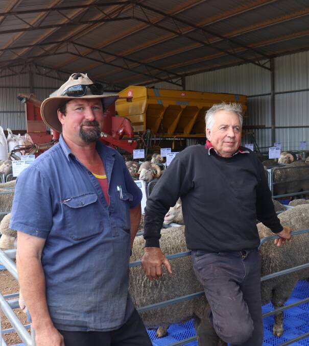 Glen Askew (left), Boyup Brook and Rob Decampo, Frankland, inspected the rams on offer prior to the sale at Boyup Brook.