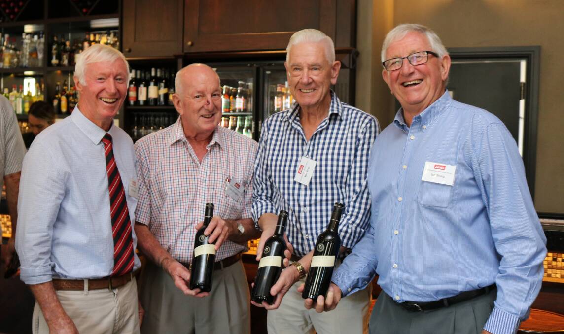 Happy to be taking home a bottle of red each as door prize winners presented by EPEA president Bob Peake, Kondinin (left) were Chris O'Loughlin, Mandurah, Mal Virgo, Scarborough and Ian Sharp, Gelorup.