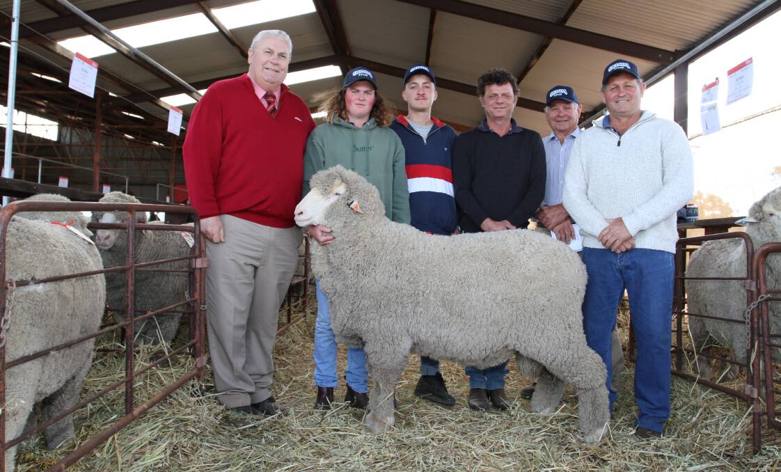 The season's $16,500 third top-priced Merino/Poll Merino ram was this two-tooth Poll Merino sire which sold at the inaugural Olinda Poll Merino ram sale at Wyalkatchem. With the ram were Olinda and Old Aprelia stud classer Kevin Broad (left), Elders stud stock, Luke Eaton, Olinda stud, Wyalkatchem, buyers Isaac and James Panizza, Old Aprelia stud, Marvel Loch and Olinda stud principals Don and Brad Eaton.