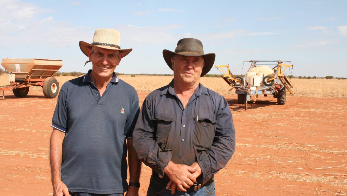 Geoff Manning (left), Serpentine and Graham Deacon, Serpentine, made the trip to Gutha to look at the hay equipment. Unfortunately neither of them went home with the items.
