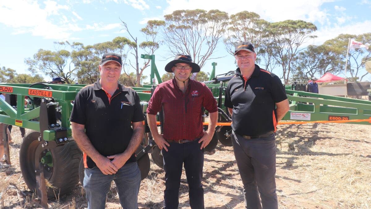 Ausplow national service manager Ray Beacham (left) and chief executive officer Chris Farmer (right) with Tim Boekeman from Boekeman's Dalwallinu dealership with the E600-20 Easitill deep ripper.