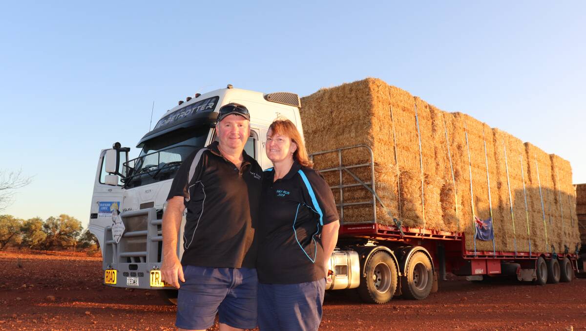 Grass Patch farmers Graham 'Rocket' and Alanna Harris in front of their truck at Sherwood station, Meekatharra.
