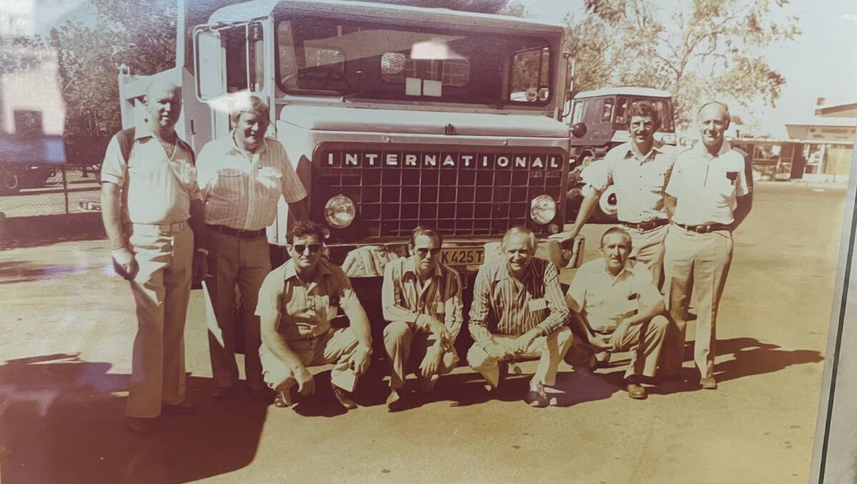 An early photograph of Roy Purcher (centre) on an International Truck tour to South Africa. 
