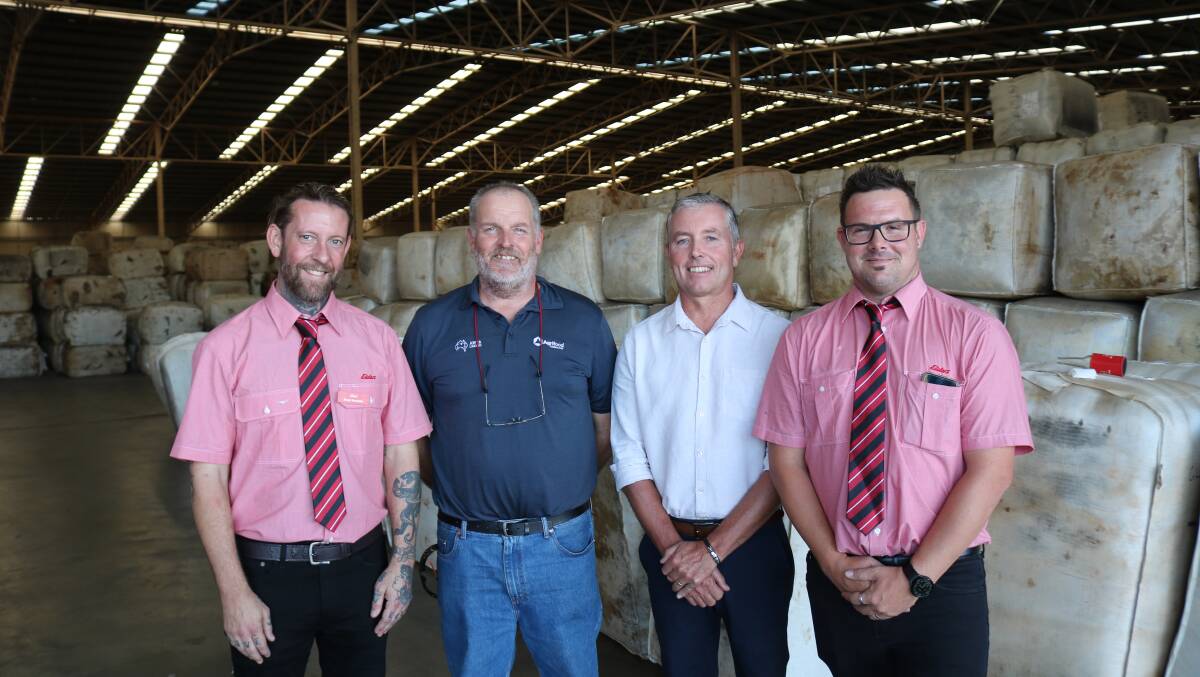 Elders wool technician Stuart Huxtable (left), Australian Wool Testing Authority laboratory manager Terry Dobson, Scanlan Wools director Darren Shivers and Elders wool lead hand Chris Green looked through the facility.