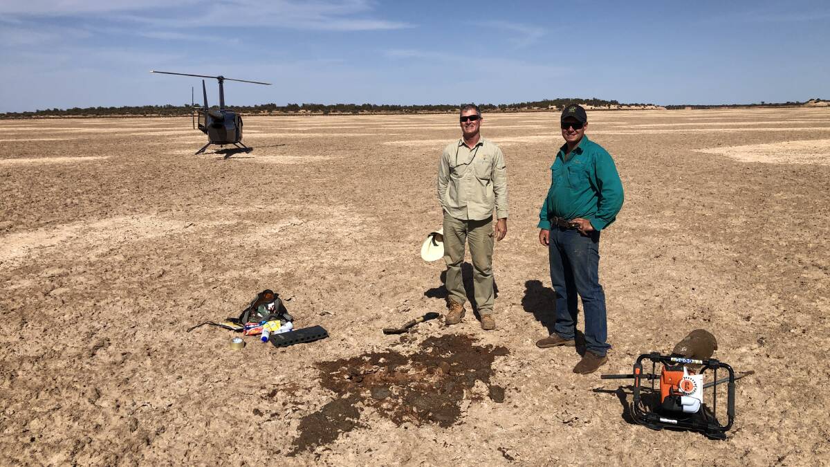 Geologists employed by Trigg Mining on Lake Throssell, 180 kilometres east of Laverton, drilling shallow reconnaissance sampling holes which have indicated promising potassium results.