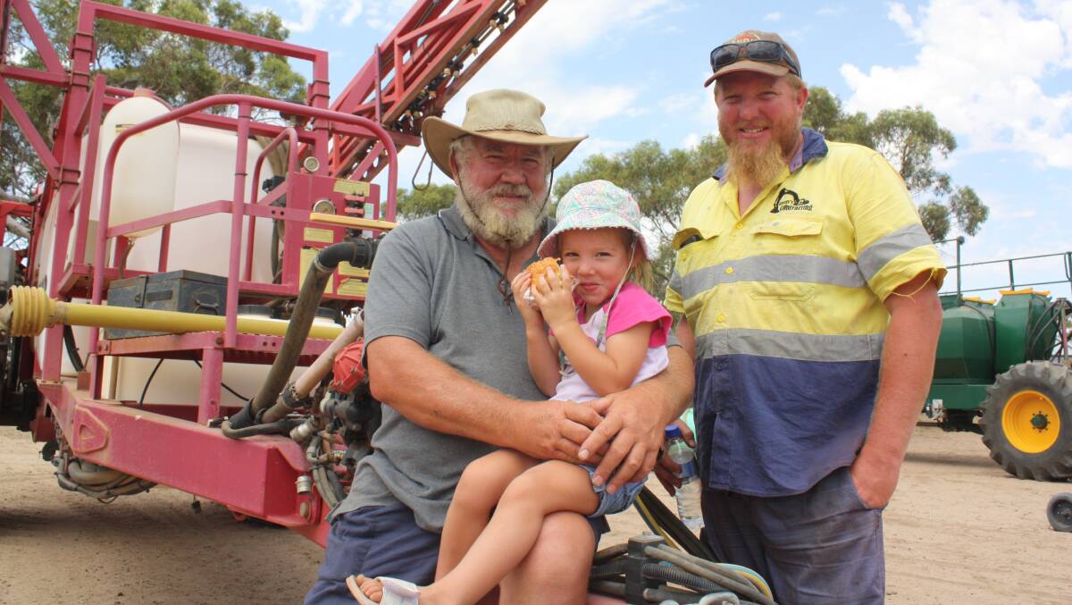 Colin (left) and Trevor Glass, Calingiri, with Trevor's daughter Ruby resting on a Croplands Pegasus 5000 model which was passed-in after a sole bid of $5000. It sold after the sale for $12,500 which was a figure more in line with vendor expectations.