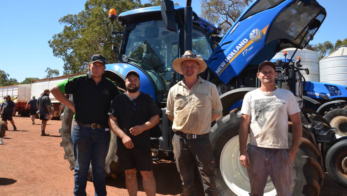 Louis Payne (left), Nutrien Ag Solutions, Williams, Angus Laurie, Gidgegannup and Mitch Johnston and Matt Gillett, both from Williams, in front of the 2018 New Holland T7.190 front-wheel-assist tractor showing 1477 hours, that was passed in at $90,000.