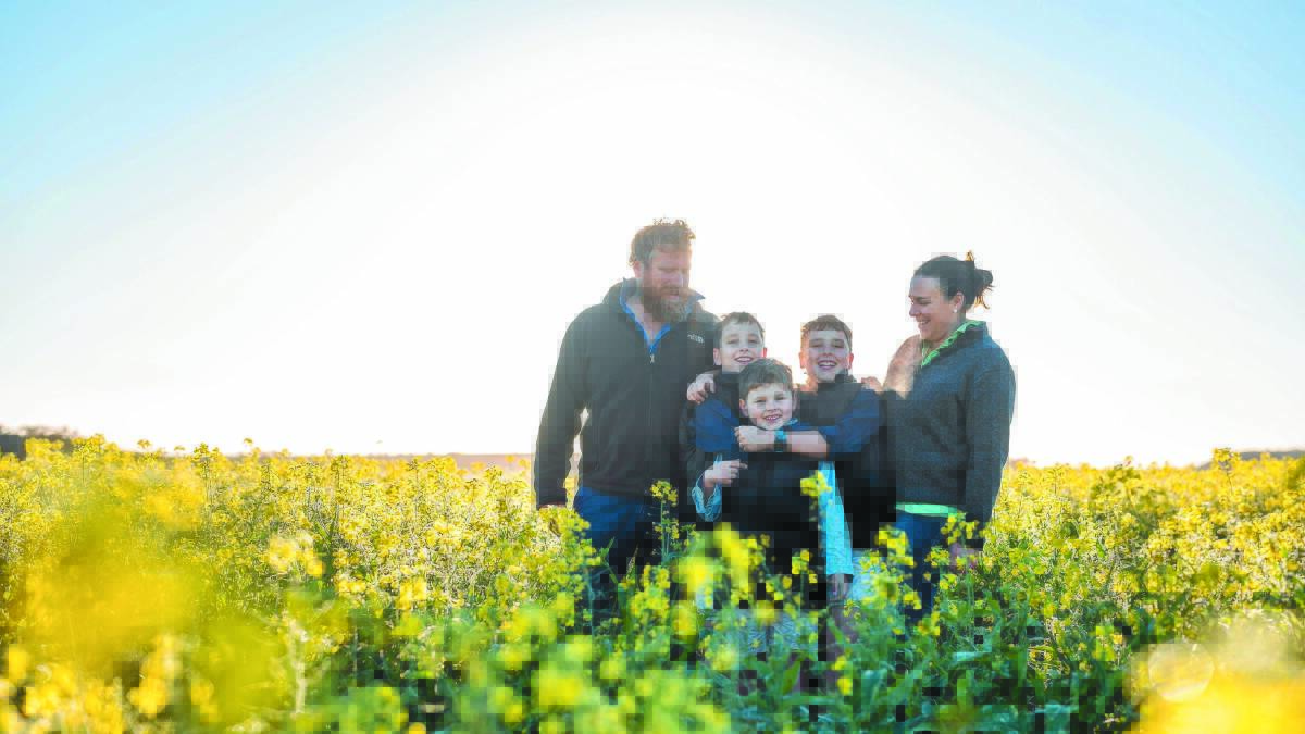 Farmers from Eradu, Liam and Fiona Mann with children James (left), 11, George, 8 and Callum, 11, have taken growing canola to the next level in producing their own cold pressed canola oil, known as Block 275. Photo by YM Photography.