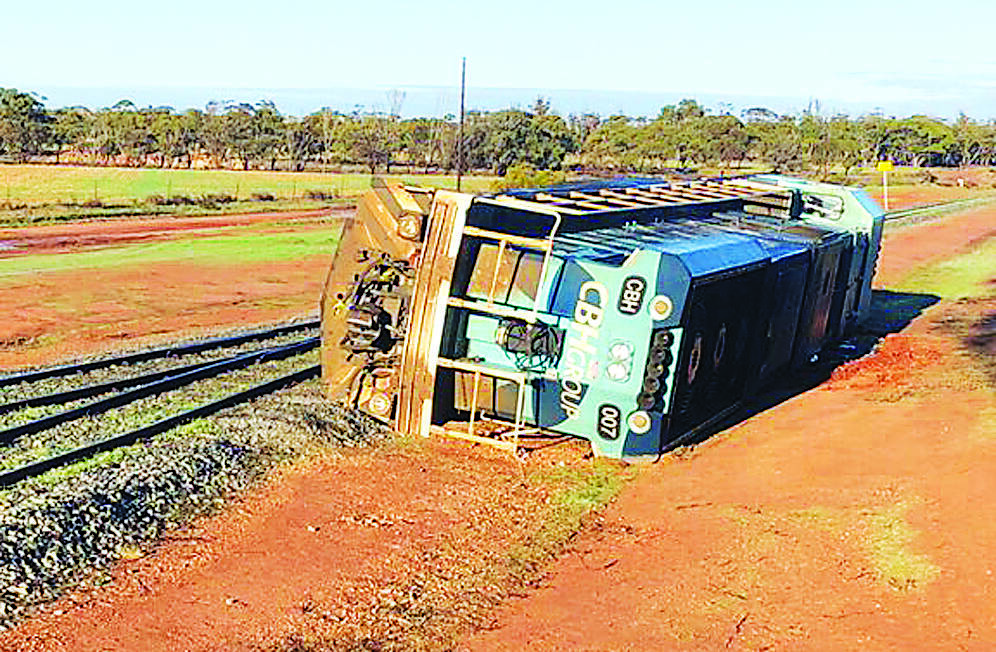 This locomotive carrying 1400 tonnes of barley on 30 wagons derailed on the Toodyay to Miling freight line last week. Photo supplied.