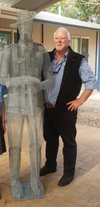 Peter Grigg with the first prototype of the Spirit Soldier, designed and made by artist Kirsten Sivyer. 