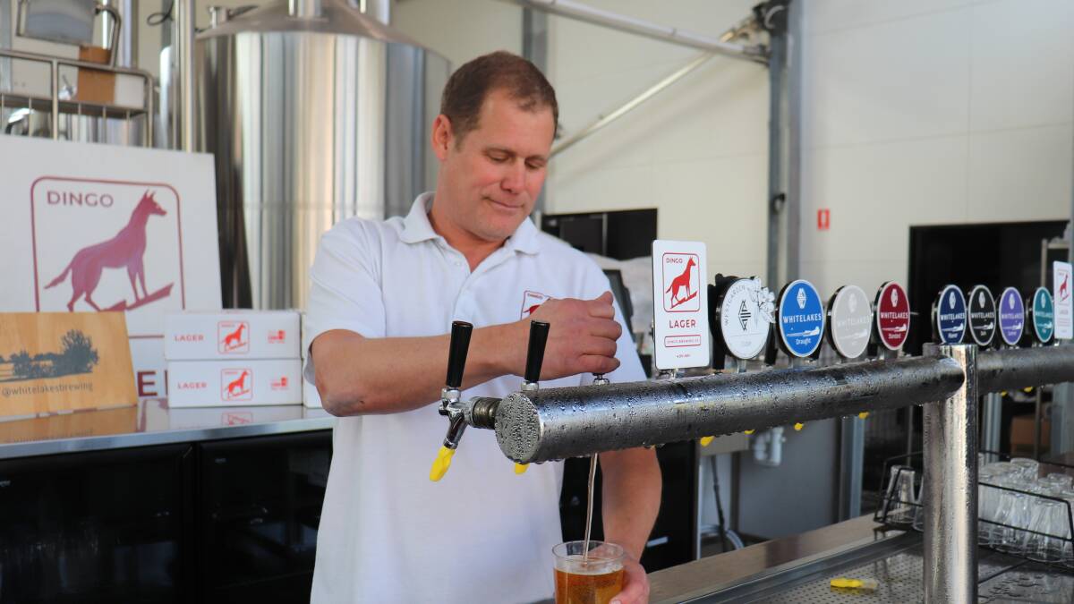 Sean Symons is the head brewer for both Dingo Brewing Company and White Lakes Brewing Company.