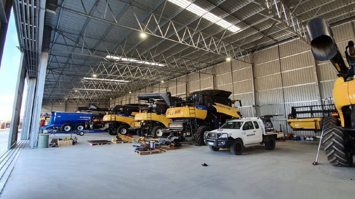 The interior of the new McIntosh & Son, Geraldton, service workshop easily caters for big equipment with enough space for multiple machines to be serviced at the same time.