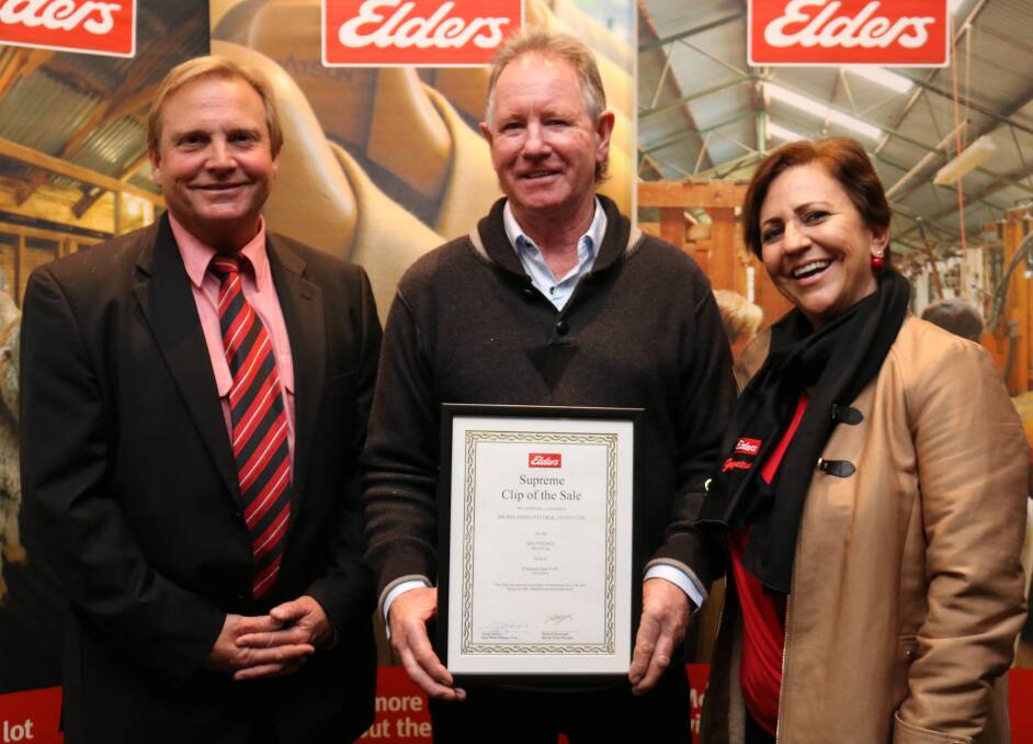 Elders district wool manager Michael Fairclough (left), congratulated Shorelands Pastoral connections Michael Bowman and Maria Magalhaes, Williams, on Shorelands Pastoral winning the Supreme Clip of the Sale award for sale F16.