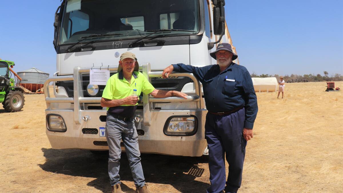  Bridgetown neighbours Stan Bolton (left) and Chris Gardiner inspecting the 70 tonne rated 2008 Mercedes Benz Actross 3244 8x4 tipping tray truck with removable bin and 20-wheel tipper trailer combination that became the equal second highest priced lot at $165,000.