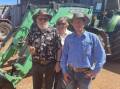 Vendors of the Minston Park, Bindoon, clearing sale, Kay (left) and Ave McDonald, with Westcoast Wool & Livestock Gingin agent and sale auctioneer Jeremy Green, in front of the top-priced lot at last weeks sale, a 2017 Deutz-Fahr tractor fitted with lift forks and bucket, which sold for $67,000 to GW & NL Thomas, Gingin.