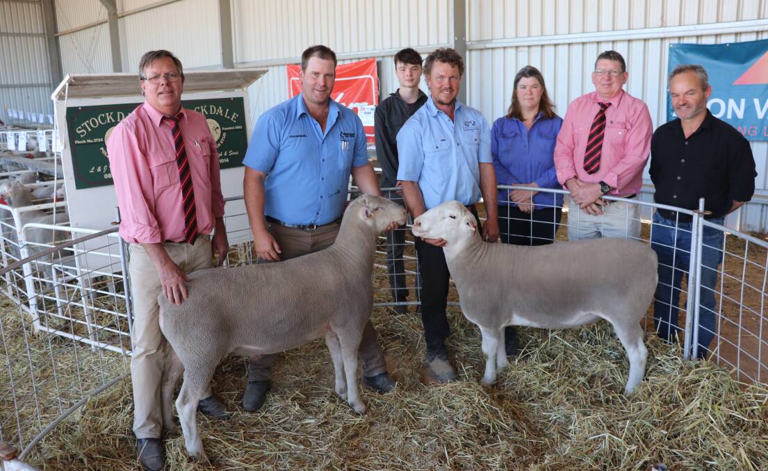 With the two $3000 equal top-priced White Suffolk rams purchased by Merna stud, Quairading and the Rhos Gwyn stud, Mt Barker, were Elders auctioneer Graeme Curry (left),Westcoast Wool & Livestock Brookton Pingelly agent Stephen Keatley, Oliver Bush, Mt Barker, Stockdale stud co-principal Brenton Fairclough, buyer Stacey Bush, Rhos Gwyn stud, Mt Barker, Elders prime lamb specialist Michael O'Neill and Robert Bush, Rhos Gwyn stud.
