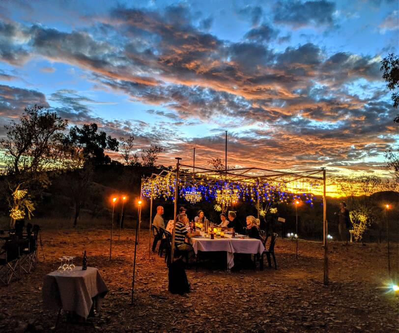  Overlooking the vast Lake Argyle from a private lookout, diners are treated to the ambience of the Kimberley sunset, as it transforms into a star-lit sky.