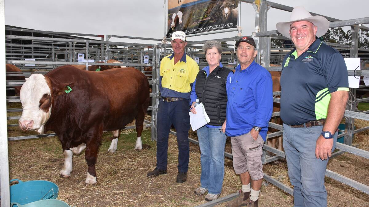With the $7000 top-priced bull from the WA College of Agriculture (WACOA) Denmarks Inlet Views stud, Inlet Views Titanic T009, were WACOA Denmark farm manager Kevin Marshall (left), buyers Anna and Les Wolfe, LE & AG Wolfe, Denmark and WACOA Denmark beef technical officer Brad Seib. Along with this bull the Wolfes purchased a second bull from Inlet Views at $5000 and a Naracoopa traditional Simmental bull at $5000.