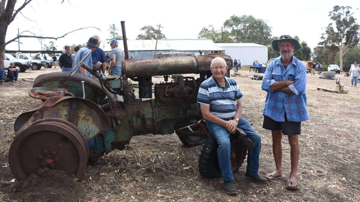 John (left) and Jeff Greay, Narrikup, with the Fordson Tractor which sold in the sale for $300.