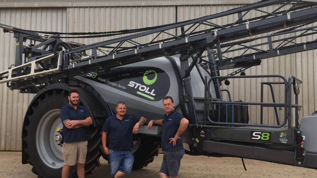 McIntosh & Son Merredin branch manager Rob Pauley (right) was last week pictured in front of this new Stoll S Series trailed boomsprayer with his sales staff, Corey Harken (left) and Terry Wilcox.