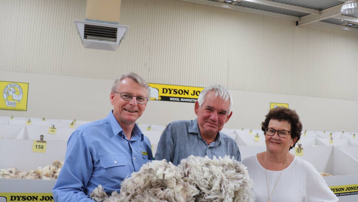 Dyson Jones Wool Marketing Services broker Carl Poingdestre (left), with Ross and Leanne Proud, Toodyay, whose 17.1 micron fleece attracted top bid at the Western Wool Centre last Thursday.
