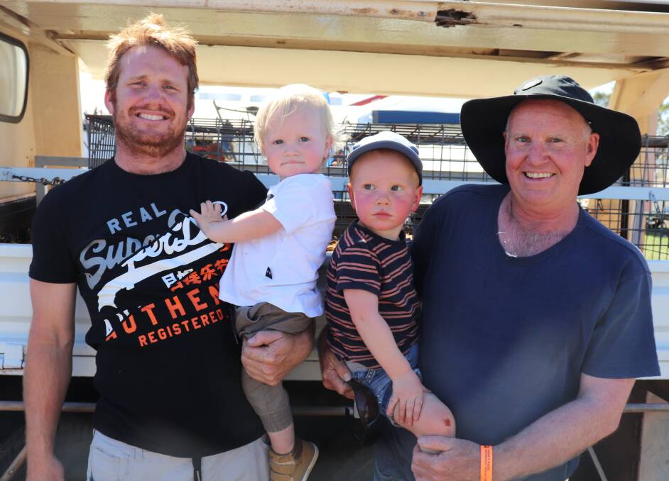 Daniel Munns (left) with son Parker and Jeff Munns with grandson Jimmy Cooke, Beacon.