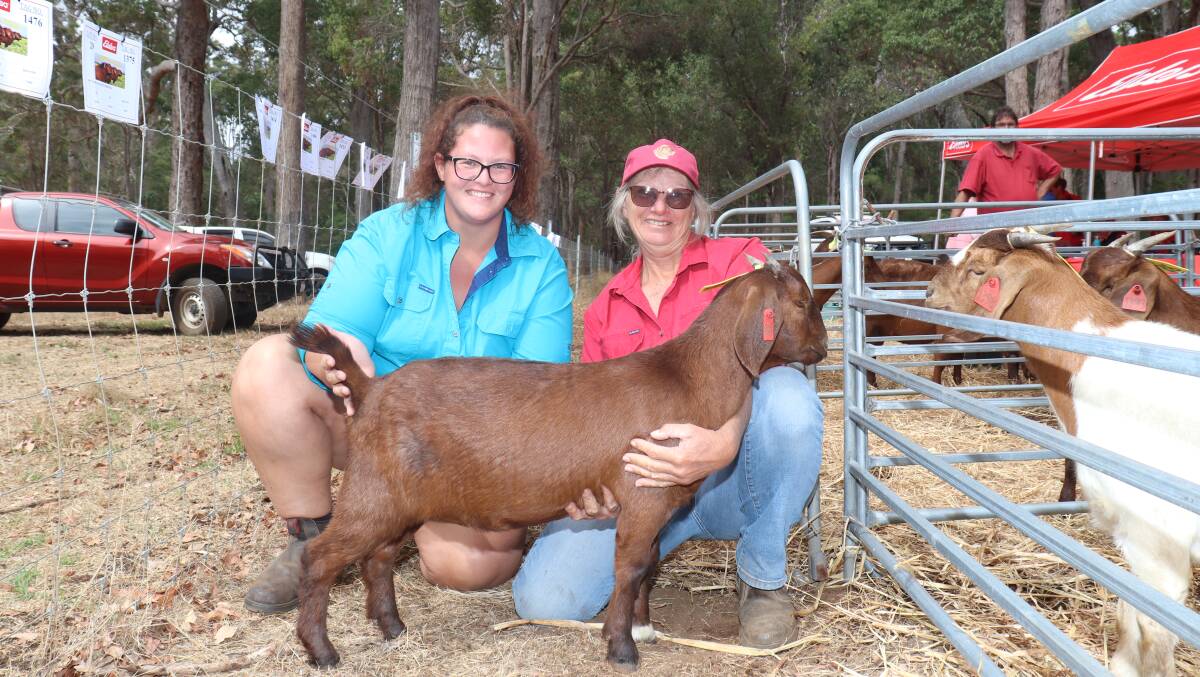 Taking home the top-priced $925 doe offered by Maranal Farm, Nungarin, was Sarah Cook (left), Timlen Boer goats, Harvey, with Maranal Farm stud principal Marion Cahill.