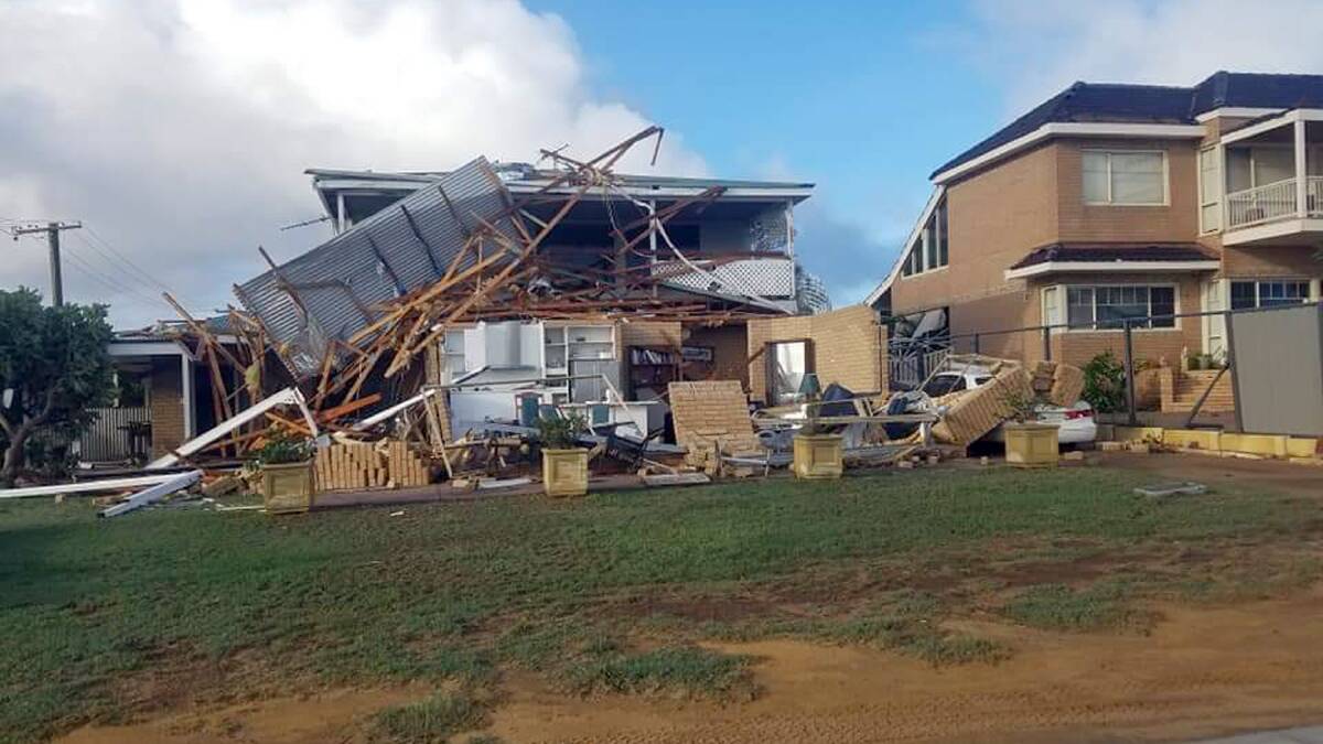 A house in Kalbarri destroyed, while the neighbouring property appears unscathed.