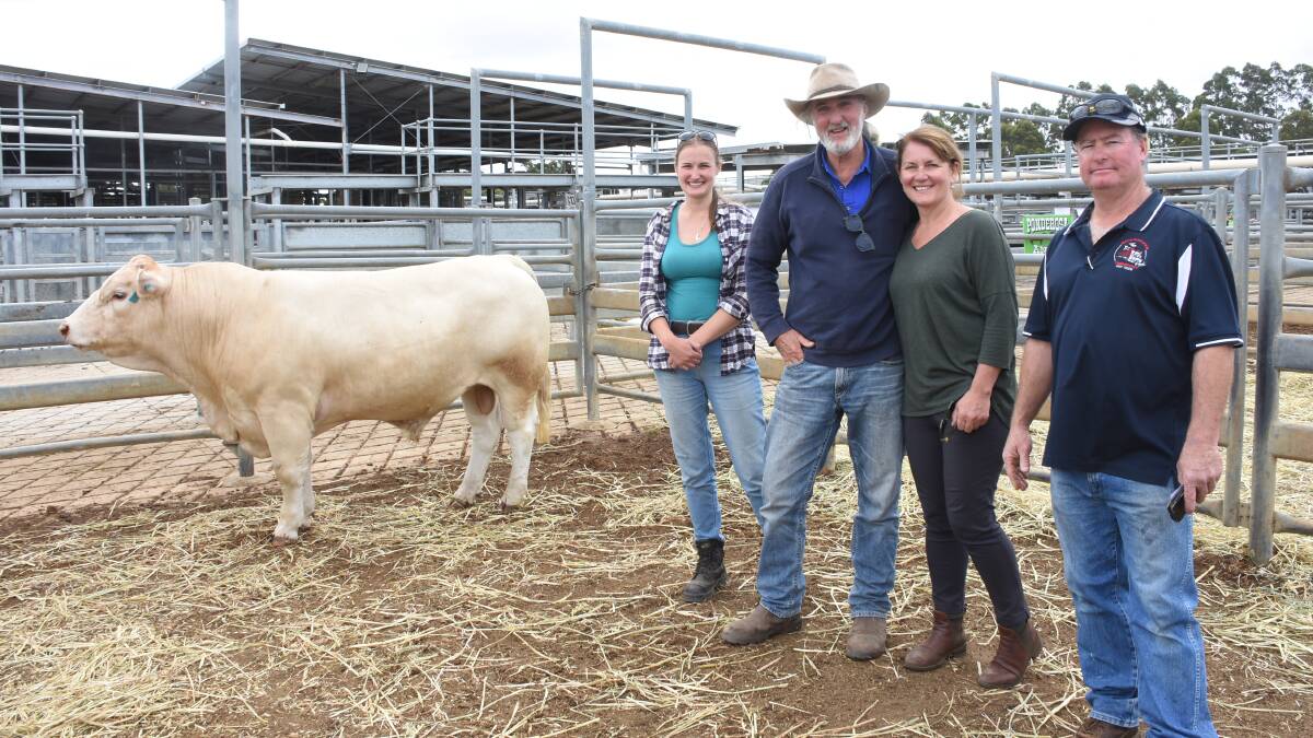 With the $9500 top-priced Charolais bull, Quicksilver Schooner S45 (P) from the Quicksilver stud, Newdegate and Narrikup, were buyers Ingrid (left) and Graham Ayres and Helen Marshall, Graham Ayres Livestock, Bornholm and Quicksilver co-principal Doug Giles.
