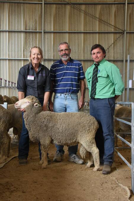 Prices hit a high of $10,400 at last week's Anderson Rams Poll Merino on-property ram sale at Kojonup. With the top-priced ram were Anderson principal Lynley Anderson (left), buyer Peter Smith, Bremer Bay and Nutrien Livestock Kojonup agent Troy Hornby.