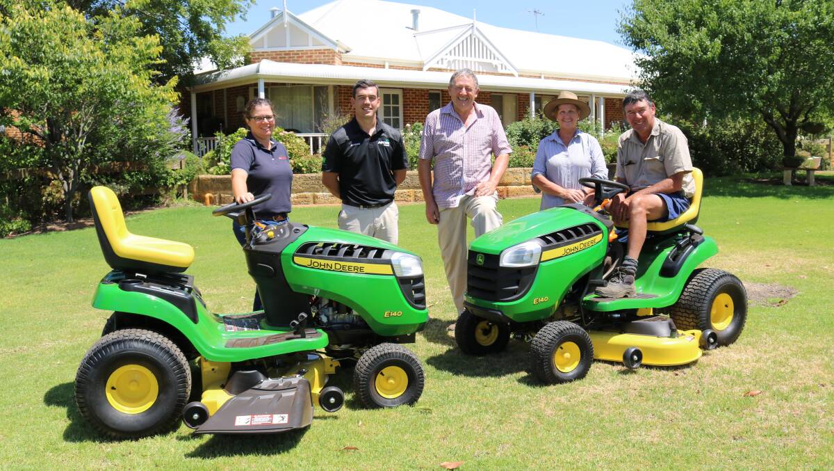 With the two John Deere E140 Select Series ride-on-mowers from AFGRI Equipment which will be given out as prizes in the competition at its launch were Farm Weekly livestock manager Jodie Rintoul (left), AFGRI Equipment Australia marketing and small ag manager Jacques Coetzee, WA Angus Society chairman Mark Hattingh and Irene and Steve Neville, Old Bambun Grazing, Gingin, who will supply the heifers for the competition.
