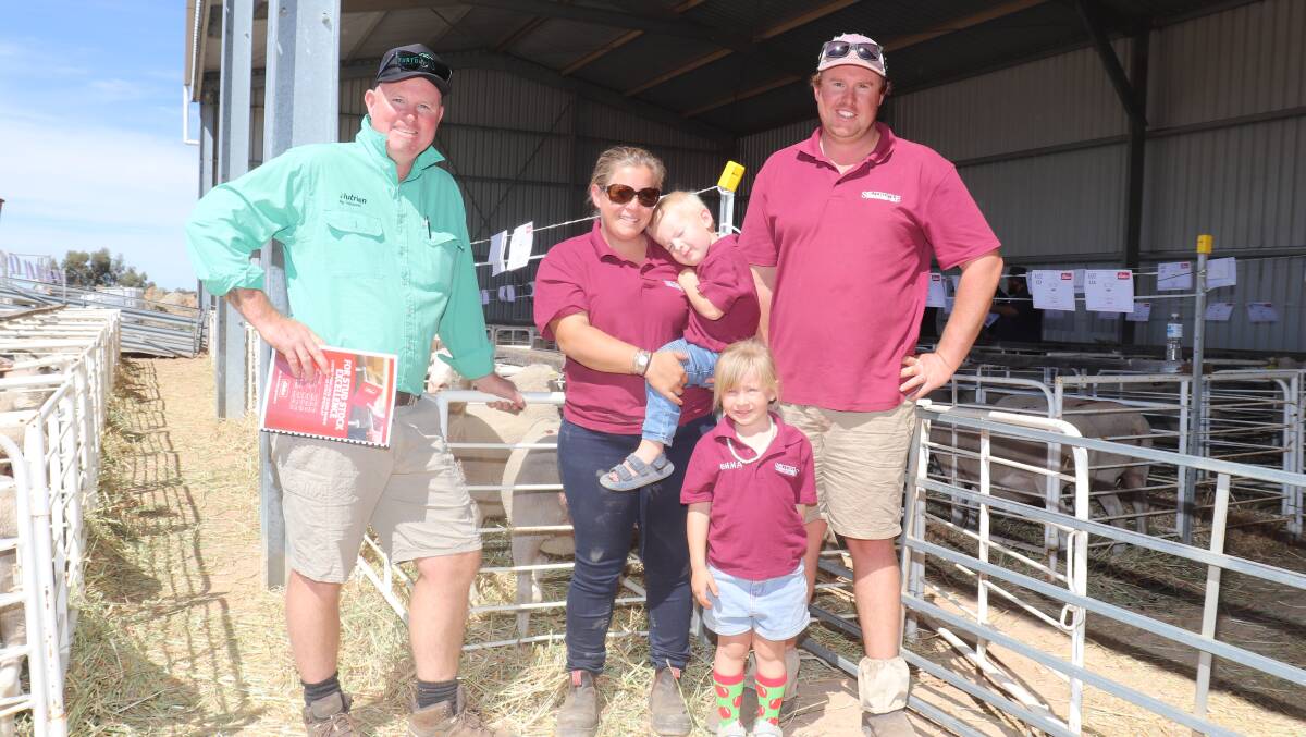 Nutrien Livestock Pingelly/Brookton agent Chris Turton (left), with clients Holly and Toby Blechynden and their children Douglas and Emma, Southdale White Suffolk stud, Brookton, were at the sale looking for ewes which fitted their breeding objectives. In the sale the Blechyndens purchased seven White Suffolk ewes at an average of $482 and to a top of $550.