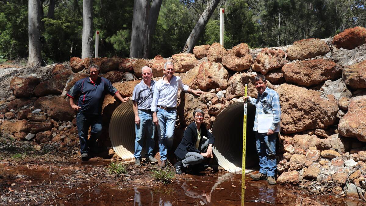 Manjimup farmers John Kilrain (left), Peter McGinty and Brian 'Barnie' Valentine (right) with hydrologist Kim Taylor and former South West Greens MLC Diane Evers on Record Brook which will be dammed to store water for the Southern Forests Irrigation Scheme.