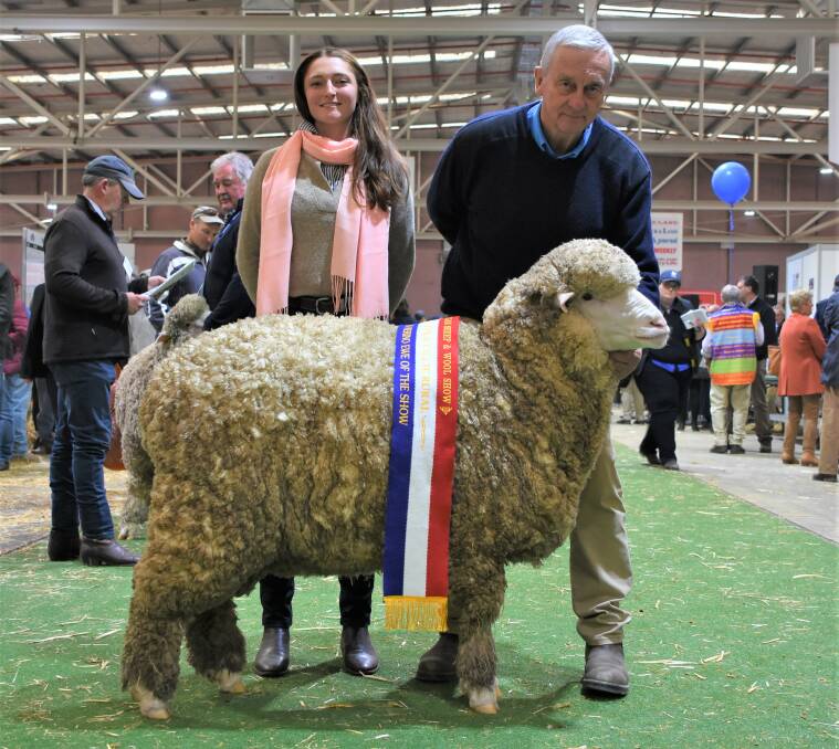 The Hollow Mount stud, Crookwell, NSW, exhibited the grand champion ewe of show. With the ewe which was also sashed the grand champion fine wool ewe, champion fine wool Merino ewe and champion August shorn fine wool Merino ewe were Hollow Mount stud assistant Avalon McGrath and stud manager David Zouch.