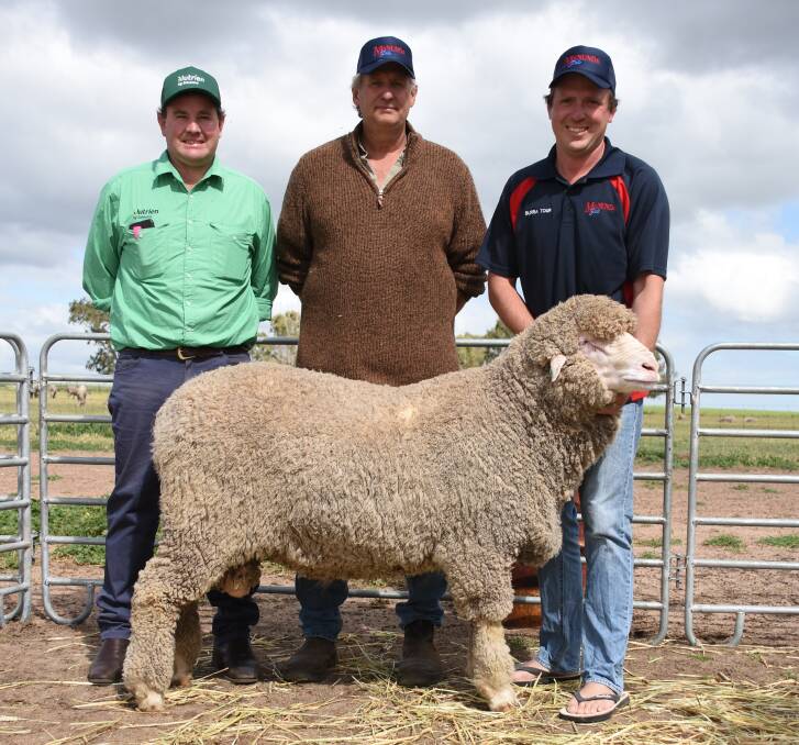 Prices hit a high of $8000 for this ram at the Manunda Poll Merino on-property ram sale at Tammin when it sold to the Arra-dale stud, Perenjori. With the ram were Nutrien Livestock Breeding representative Mitchell Crosby (left), buyer Les Sutherland and Manunda's Scott Button.