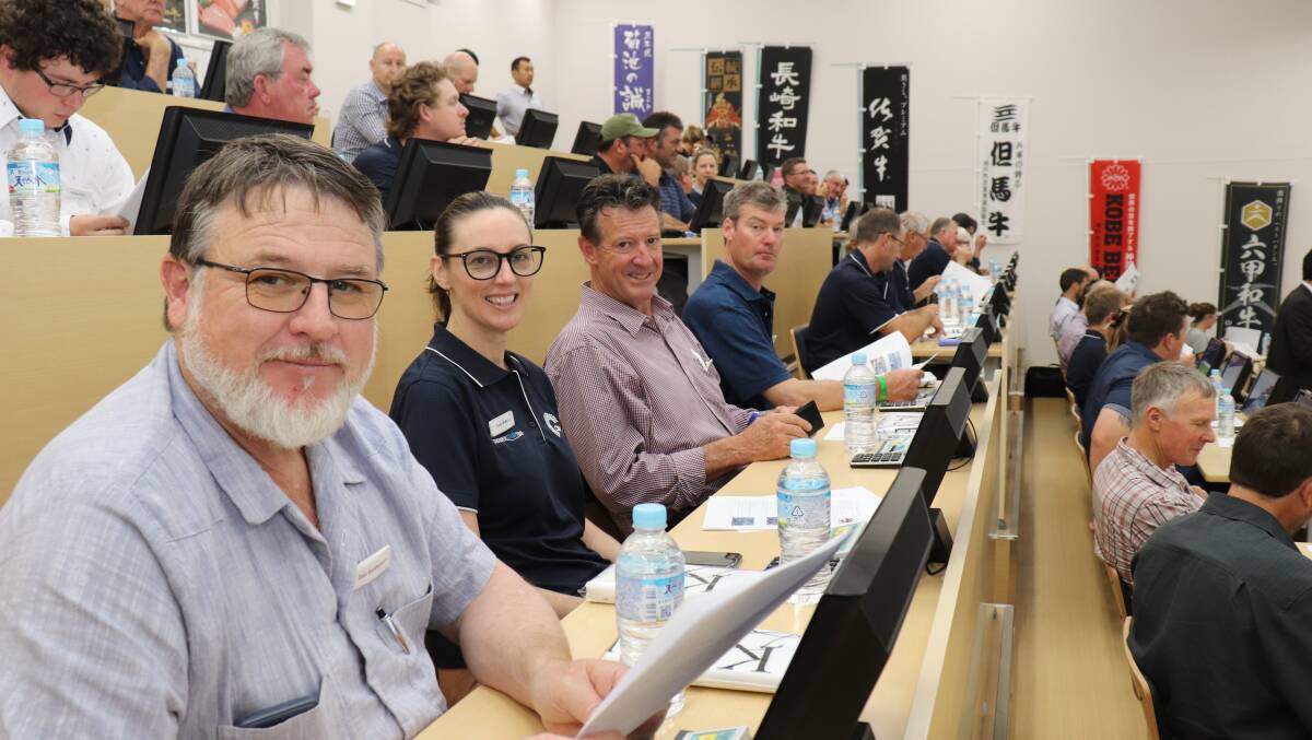 Dan Sanderson (left), Grass Patch, CBH corporate affairs adviser Jody McMiles, Rod Birch, Coorow and Peter Roe, Grass Valley, sitting at bidding terminals in the live bidding room at the Wagyu Master Meat Centre in Himeji city, Japan.