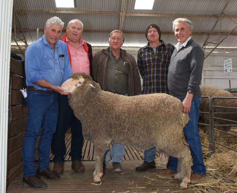 With the $7000 top-priced ram at the Woolkabin on-property ram sale at Woodanilling last week were stud co-principal Eric Patterson (left), Elders stud stock representative and Woolkabin classer Kevin Broad, buyers George and Rowan Lavender, Lavender Farming Co, Williams and Woolkabin stud co-principal Chris Patterson.