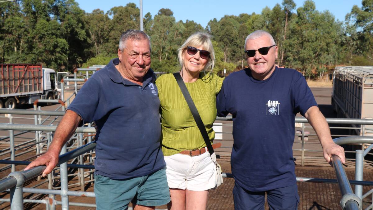 Paul Curulli (left), Harvey, was at the sale with Irish visitors, Mary and Anthony Moore from Belfast, who found the sale interesting.