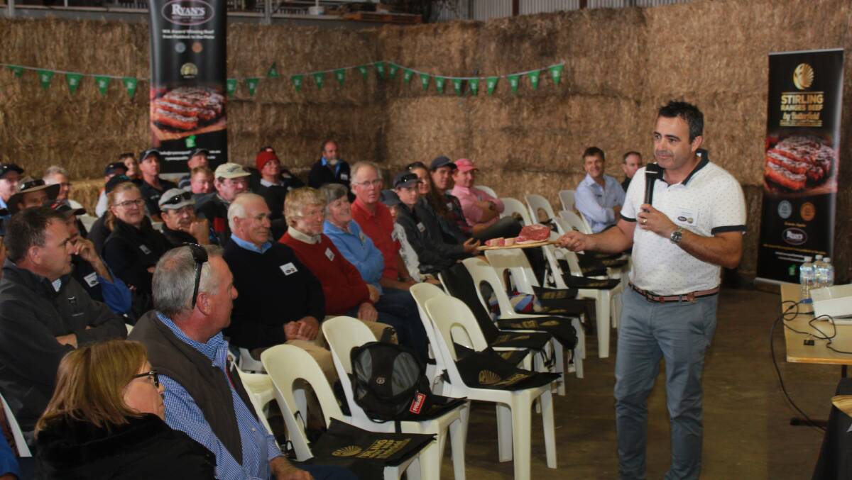 The Meat Specialist RafaelRamirez asking the crowd if they can identify the cuts of meat he is holding as part of his presentation at the Borden beef field day last week.
