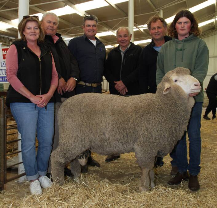  With the Willemenup ram that sold privately for $10,000 to the Olinda stud, Wyalkatchem, were Kylie Eaton (left), Olinda stud, Olinda stud classer Kevin Broad, Elders stud stock, Collyn Garnett, Willemenup stud, Gnowangerup and Don, Brad and Luke Eaton, Olinda stud. The ram was AI bred by East Bungaree 37 with tests of 20.8 micron, 3.1 SD, 14.9 CV, 99.3pc CF and 76.7pc yield. Don Eaton said they have been past stud buyers at Willemenup and only first saw the ram at the Long Wool Day. "Good safe sheep with a pure muzzle and good wool and backend," Mr Eaton said.